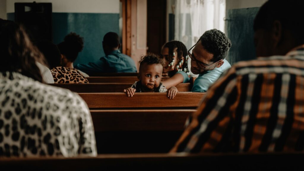 Family in church pews